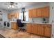 Laundry room offering a sink, cabinets and an adjacent washer and dryer at 5935 River Forest Cir, Bradenton, FL 34203