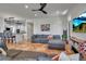 Open-concept living area featuring modern decor, tile flooring and lots of natural light at 5935 River Forest Cir, Bradenton, FL 34203