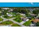 Aerial view of a centrally located home near major thoroughfares, shopping and restaurants at 5948 Mirror Lake Rd, Sarasota, FL 34238