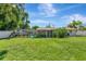 Large backyard with screened in lanai and in-ground pool at 5948 Mirror Lake Rd, Sarasota, FL 34238