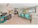 Bright living room with decor and view of the dining area at 5948 Mirror Lake Rd, Sarasota, FL 34238