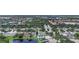 Scenic aerial view of a residential community with lush greenery and multiple ponds at 6043 44Th E Ct, Bradenton, FL 34203