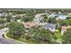 Neighborhood aerial view featuring beautiful homes and landscaping near a tranquil lake at 6043 44Th E Ct, Bradenton, FL 34203
