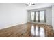 Generous sized bedroom with hardwood floors, neutral paint and natural light at 6043 44Th E Ct, Bradenton, FL 34203