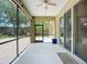 Spacious covered patio with access to the landscaped backyard at 6043 44Th E Ct, Bradenton, FL 34203