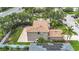 Stunning exterior showcasing manicured landscaping and a charming two-story design in a desirable neighborhood at 6043 44Th E Ct, Bradenton, FL 34203