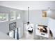 Open living space features an eat-in kitchen, dining area, large windows, and high ceilings at 6043 44Th E Ct, Bradenton, FL 34203