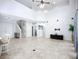 Spacious living room with soaring ceilings, neutral walls, and open floor plan at 6043 44Th E Ct, Bradenton, FL 34203
