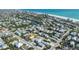 Aerial view of a beach neighborhood with a home that features a pool and is near a body of water at 616 Fern St, Anna Maria, FL 34216