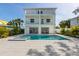Stunning home with a large pool, spa and a spacious outdoor entertainment area at 616 Fern St, Anna Maria, FL 34216