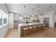 Bright, spacious kitchen with a large center island and modern stainless steel appliances at 616 Fern St, Anna Maria, FL 34216