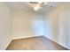 Cozy bedroom with carpeted floors and a ceiling fan, offering a comfortable and private space at 6509 Grand Estuary Trl # 201, Bradenton, FL 34212