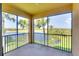 Screened lanai provides golf course views, creating a relaxing outdoor space for enjoying the scenery at 6509 Grand Estuary Trl # 201, Bradenton, FL 34212