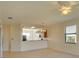 Open living space with tile flooring, connecting to a kitchen area and offering a comfortable layout at 6509 Grand Estuary Trl # 201, Bradenton, FL 34212