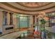 Elegant lobby with grand columns, floral arrangements, and marble flooring at 6509 Grand Estuary Trl # 201, Bradenton, FL 34212