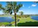 Stunning view of a golf course and serene lake, ideal for a peaceful and picturesque setting at 6509 Grand Estuary Trl # 201, Bradenton, FL 34212