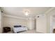 Spacious bedroom with neutral carpeting, walk-in closet, and en suite bathroom at 6923 Grand Estuary Trl # 101, Bradenton, FL 34212