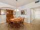 Dining area with tile floors, wood furniture, crown molding and neutral colored walls at 6923 Grand Estuary Trl # 101, Bradenton, FL 34212
