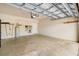 Spacious two-car garage featuring epoxy flooring and ample storage space at 6923 Grand Estuary Trl # 101, Bradenton, FL 34212