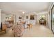 Open-concept living area with tile flooring, neutral walls, and multiple seating and dining areas at 6923 Grand Estuary Trl # 101, Bradenton, FL 34212