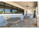 Outdoor seating area with ceiling fan and serving counter at the pool at 6923 Grand Estuary Trl # 101, Bradenton, FL 34212