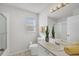Bright bathroom with a shower, toilet, and vanity at 6929 Stetson Street Cir, Sarasota, FL 34243