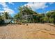 Community playground featuring swings, slide, and climbing area for outdoor fun at 6929 Stetson Street Cir, Sarasota, FL 34243