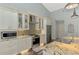 Updated kitchen with stone countertops, stainless steel appliances, and lots of storage space at 7302 Dunes Ct, Bradenton, FL 34202