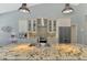 Modern kitchen features granite countertops, stainless steel appliances, and ample cabinet space at 7302 Dunes Ct, Bradenton, FL 34202