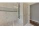 Elegant bathroom featuring a clear glass shower with multiple shower heads and jets at 7302 Dunes Ct, Bradenton, FL 34202
