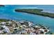 Stunning aerial view of waterfront homes with private docks along the waterways at 795 Marbury Ln, Longboat Key, FL 34228
