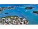 Scenic aerial view showcasing the waterfront homes nestled along the beautiful Florida coast and its waterways at 795 Marbury Ln, Longboat Key, FL 34228