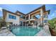 A view of the backyard pool from an angled perspective at 795 Marbury Ln, Longboat Key, FL 34228