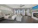 Bright and airy main bedroom with fireplace, balcony access, and luxurious finishes at 795 Marbury Ln, Longboat Key, FL 34228