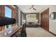 This office features a comfortable sofa, desk, and natural light, creating a productive and inviting workspace at 795 Marbury Ln, Longboat Key, FL 34228