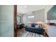 Well-lit office space with a comfortable sofa, desk, and a scenic view at 795 Marbury Ln, Longboat Key, FL 34228
