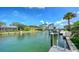 Waterfront property with a private boat dock and gorgeous views from end of dock at 795 Marbury Ln, Longboat Key, FL 34228