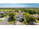 Beautiful aerial view of the house nestled in a lush, green neighborhood with mature trees at 8804 Founders Cir, Palmetto, FL 34221