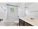 Clean and classic bathroom with a tiled shower/tub combination and a vanity sink at 8804 Founders Cir, Palmetto, FL 34221