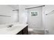 Bright bathroom with a tiled shower/tub combination and a vanity sink, providing a clean and classic design at 8804 Founders Cir, Palmetto, FL 34221