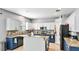 Bright kitchen featuring stainless steel appliances, granite countertops, and a functional center island at 8804 Founders Cir, Palmetto, FL 34221