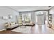 Cozy living room featuring neutral tones, a ceiling fan, and an open layout at 8804 Founders Cir, Palmetto, FL 34221