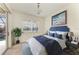 Relaxing bedroom offers a calming ambiance, stylish decor, and an inviting view of the pool at 8820 Heritage Sound Dr, Bradenton, FL 34212