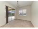 Living room features a sliding glass door that leads to the outdoor patio at 8820 Heritage Sound Dr, Bradenton, FL 34212