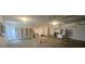 Spacious garage with ample storage cabinets, laundry area, and room for multiple vehicles and projects at 9926 Gulfstream Blvd, Englewood, FL 34224