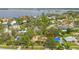 Aerial view of property featuring lush tropical landscaping and a pool at 1112 Montezuma Dr, Bradenton, FL 34209