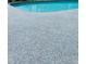 Close-up of a cool-toned pool deck surface at 1112 Montezuma Dr, Bradenton, FL 34209