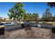 Outdoor built-in stone grill area with countertop and seating at 11434 Spring Gate Trl, Bradenton, FL 34211