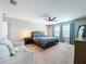 Spacious main bedroom with carpet, a ceiling fan, and lots of natural light at 12832 Oak Hill Way, Parrish, FL 34219