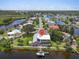 Gorgeous waterfront home boasting a private dock for boating, complemented by serene water views and lush green surroundings at 1461 Marlin St, Nokomis, FL 34275
